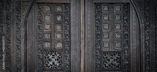 Canvas Print Traditional carving, wooden door with decorative elements.