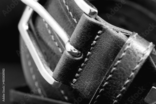 Macro shot of pants belt. Black and white photo.
