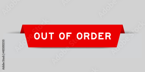 Red color inserted label with word out of order on gray background