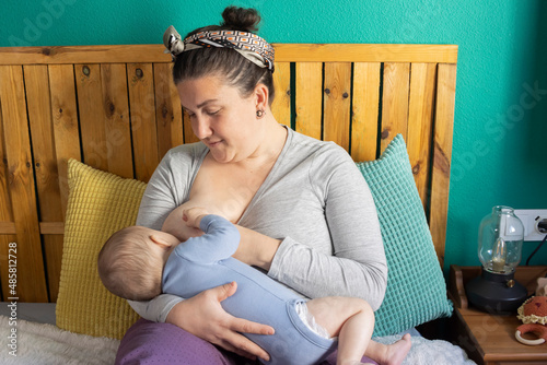 Mom breastfeeding her baby.