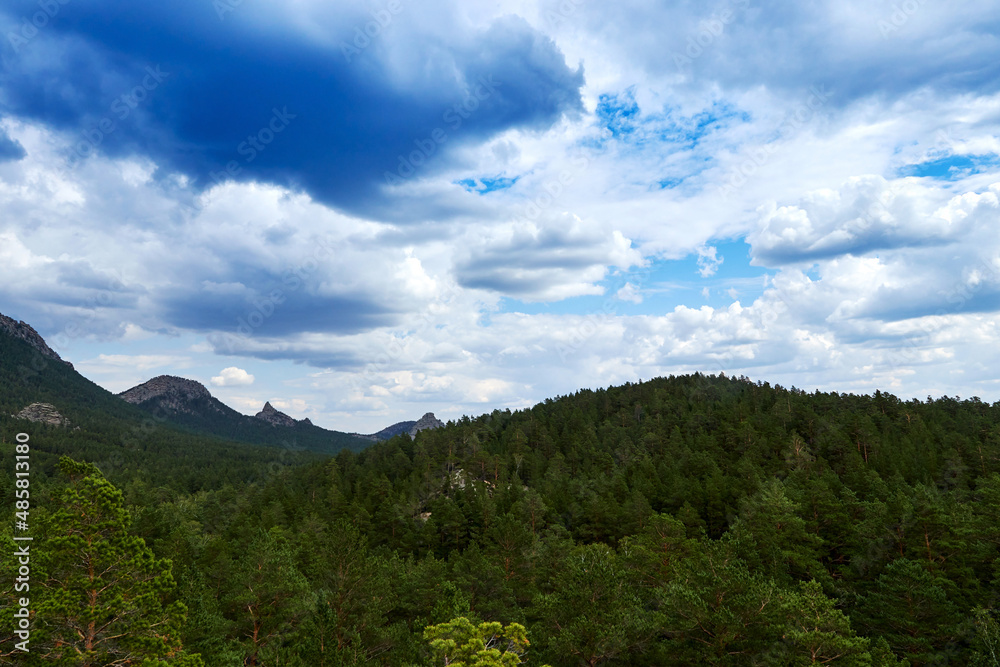 panoramic view of dramatic cloudscape over the forest