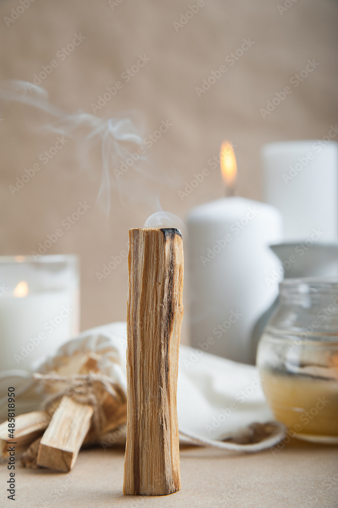 Palo Santo bars close-up and copy space. Ritual cleansing with sacred ibiocai, meditation, aromatherapy with incense and candles.. Palo Santo bars close-up and copy space. Ritual cleansing with sacred ibiocai, meditation, aromatherapy with incense and candles..