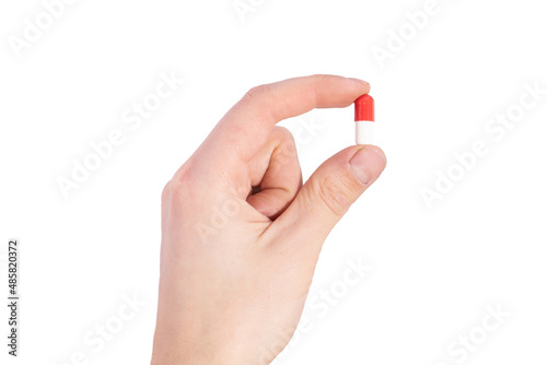 tablet capsule is held in the hand with your fingers