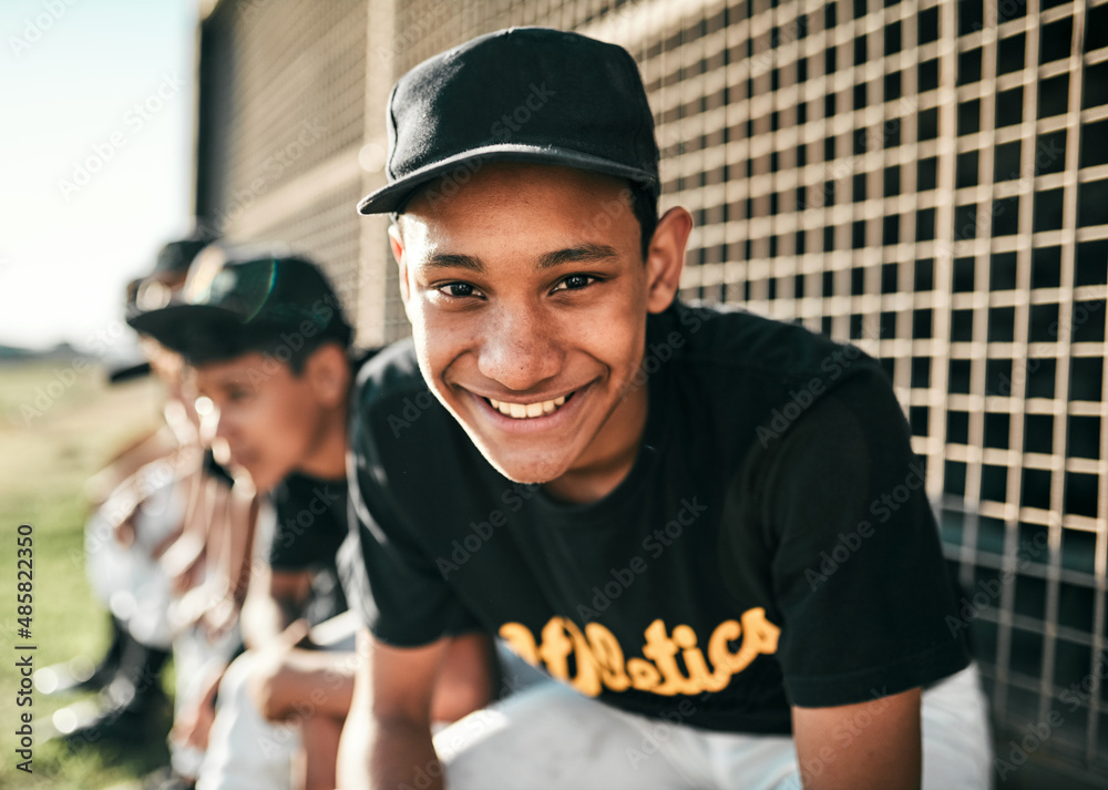 I play for the fun of it. Portrait of a young baseball player sitting on a baseball field. I play for the fun of it. Portrait of a young baseball player sitting on a baseball field.
