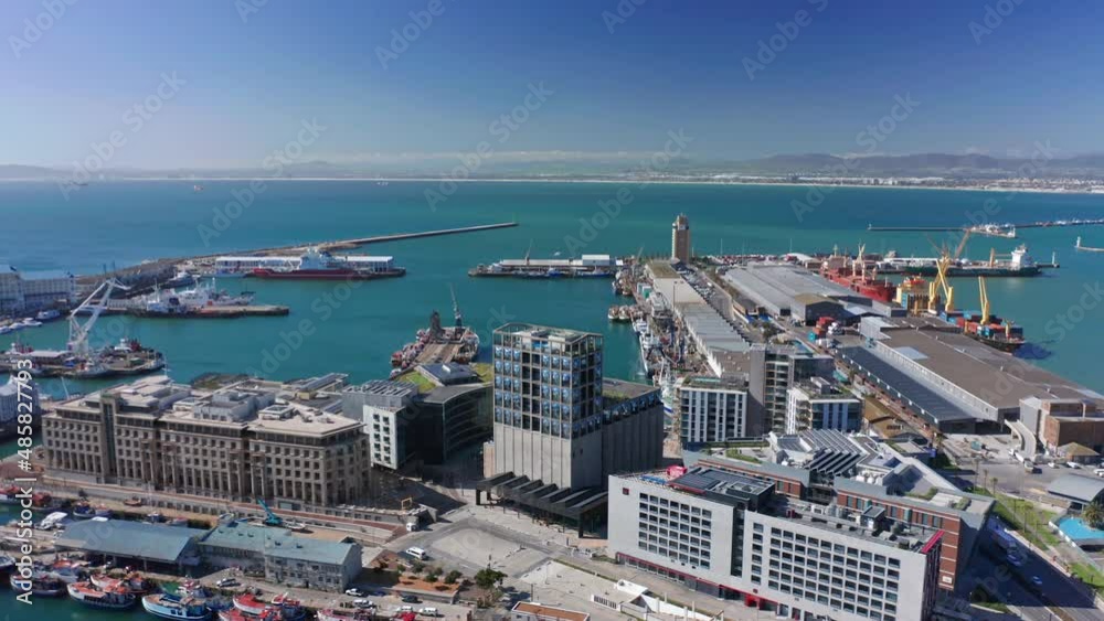 Aerial shot gently circling around some building in the harbor district of Cape Town. Aerial shot gently circling around some building in the harbor district of Cape Town.