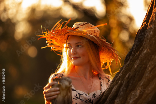 woman with snag in the forest