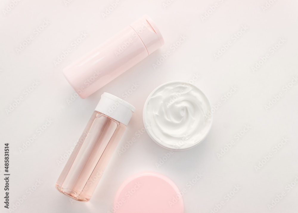 Flat lay composition with cosmetic products on a white background. Top view Flat lay composition with cosmetic products on a white background. Top view