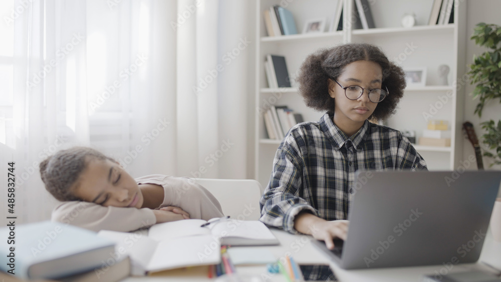 Tired teenagers preparing for school test, overwhelmed students, academic pressure