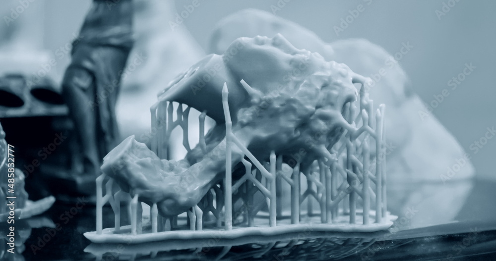 Fototapeta premium Objects photopolymer printed on stereolithography 3D printer, technology of liquid photopolymerization under UV light. Progressive modern additive technology.