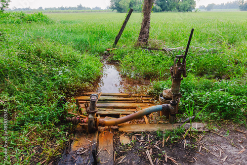 old water pump was used to pump water from under the ground to the rice fields