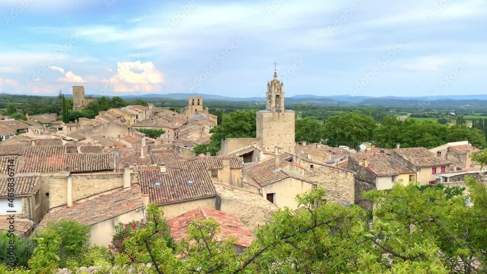 Village of Cucuron in the Luberon valley with a view on the clock tower in Provence, France Village of Cucuron in the Luberon valley with a view on the clock tower in Provence, France