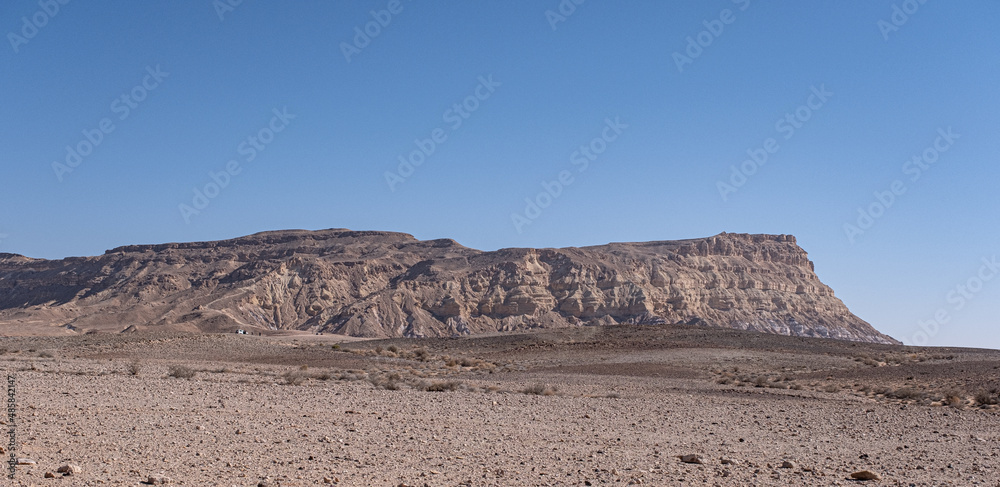 Closer view of Mount Ardon, 722 m ASL, located to the East of the Ramon Crater, near Mitzpe Ramon, south of Beer Sheba, Negev Desert, Israel	 - obrazy, fototapety, plakaty 