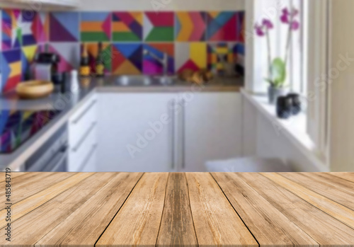 Wooden board empty table blurred background modern kitchen