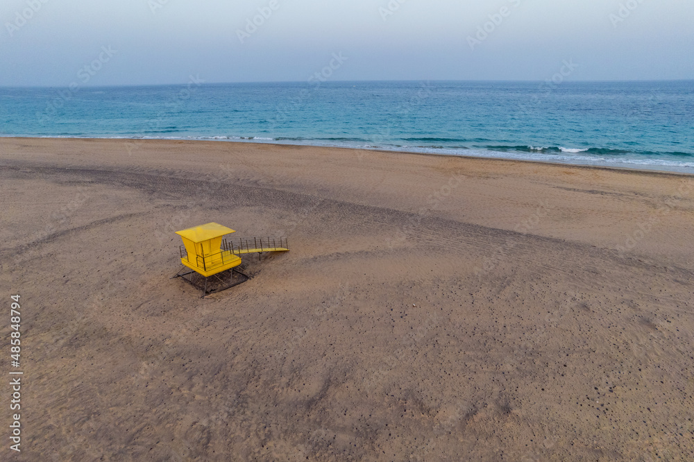 Lifeguard tower on beach in evening Lifeguard tower on beach in evening