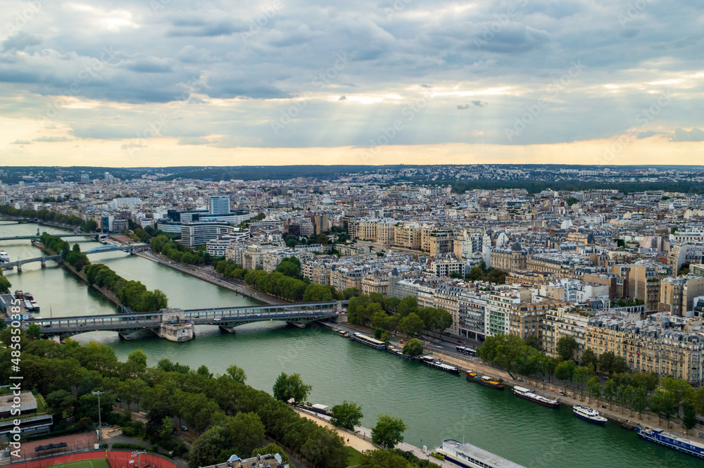 Aerial view of the city of Paris  with the nice Seine river seen from the Tour Eifel