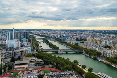 Fototapeta Naklejka Na Ścianę i Meble -  Aerial view of the city of Paris  with the nice Seine river seen from the Tour Eifel