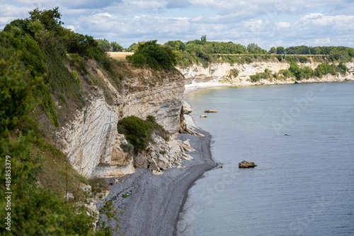 Hojerup, Denmark - July 21, 2020: View of the coastline at Stevns Klint cliff photo