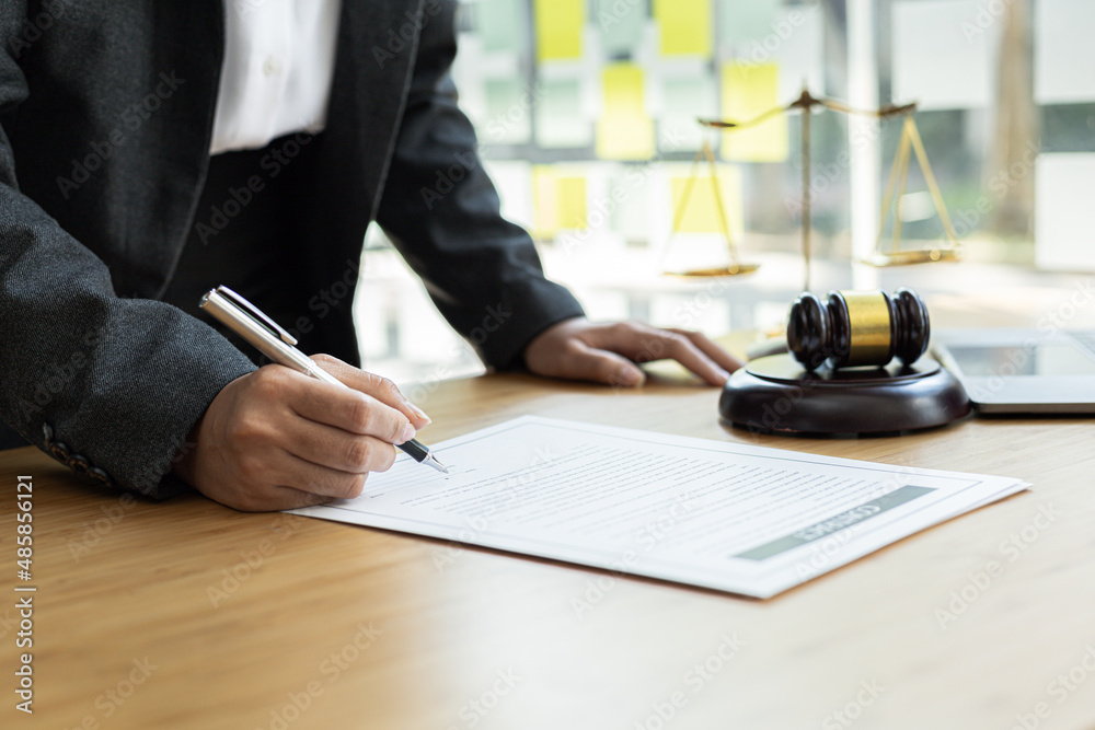 Attorneys are reviewing contract documents for the client, in which the client has filed a lawsuit against an employee at a company that commits the fraud. Fraud litigation concept. Attorneys are reviewing contract documents for the client, in which the client has filed a lawsuit against an employee at a company that commits the fraud. Fraud litigation concept.