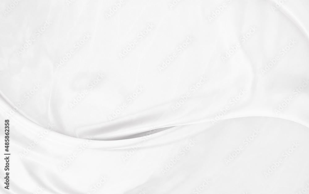 White gray satin texture that is white silver fabric silk background with beautiful soft blur pattern natural.