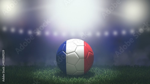 Soccer ball in flag colors on a bright blurred stadium background. France. 3D image