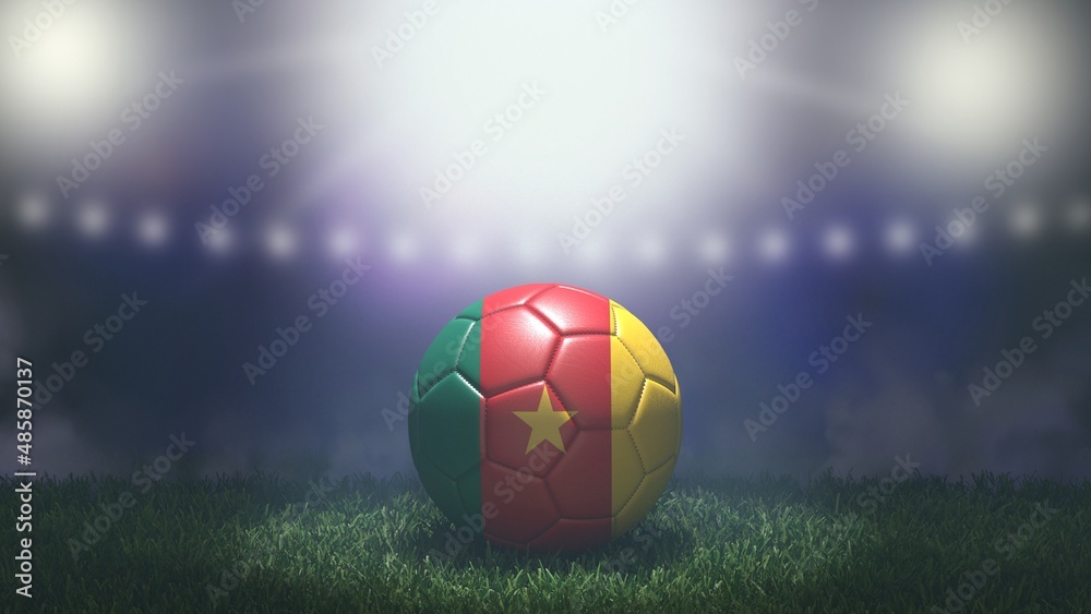 Soccer ball in flag colors on a bright blurred stadium background. Cameroon. 3D image