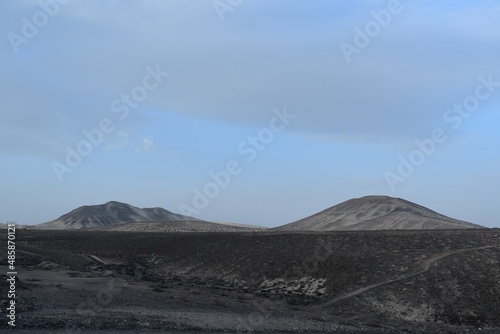  Two sandy mountains on the island of Fuerteventura.