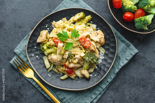 Pasta with chicken, broccoli and cherry tomato