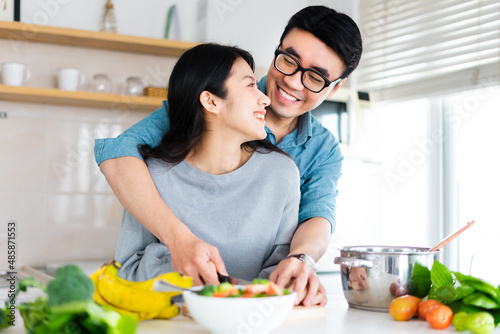 image of a couple cooking together