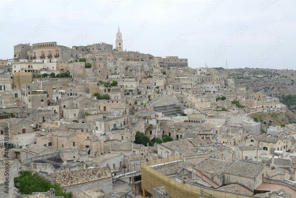 Pascoli viewpoint in Matera on the old city with the Cathedral bell tower on the top of the hill in the background