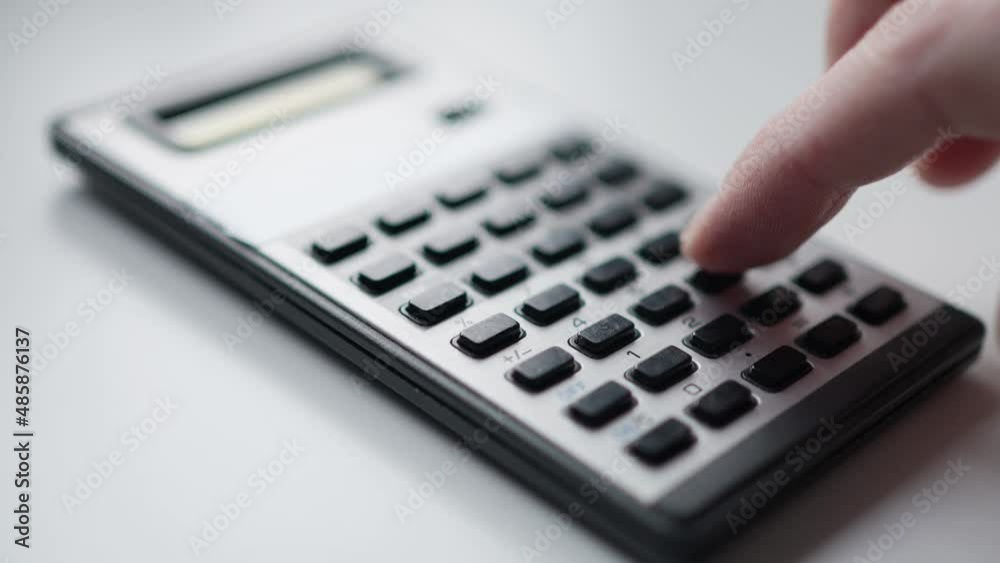 Old Retro Calculator Being Used to Calculate Closeup on Vintage Tech Old Retro Calculator Being Used to Calculate Closeup on Vintage Tech