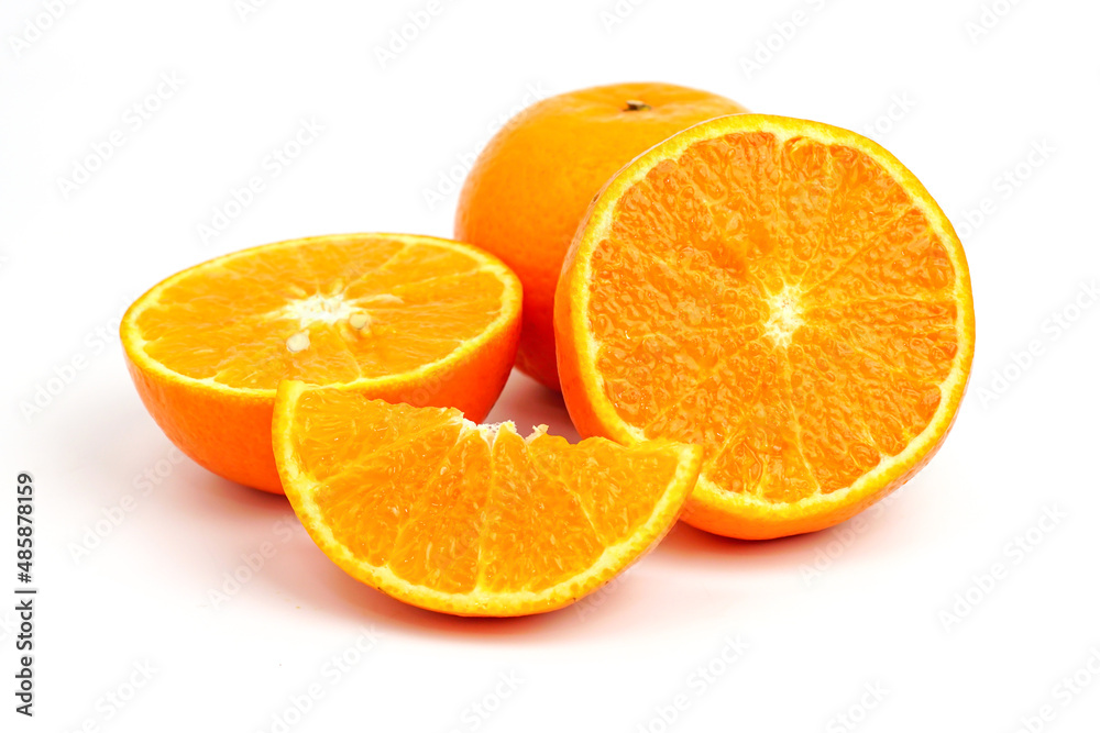 Orange slice isolated on white background. Orange macro studio photo. Orange slice isolated on white background. Orange macro studio photo.