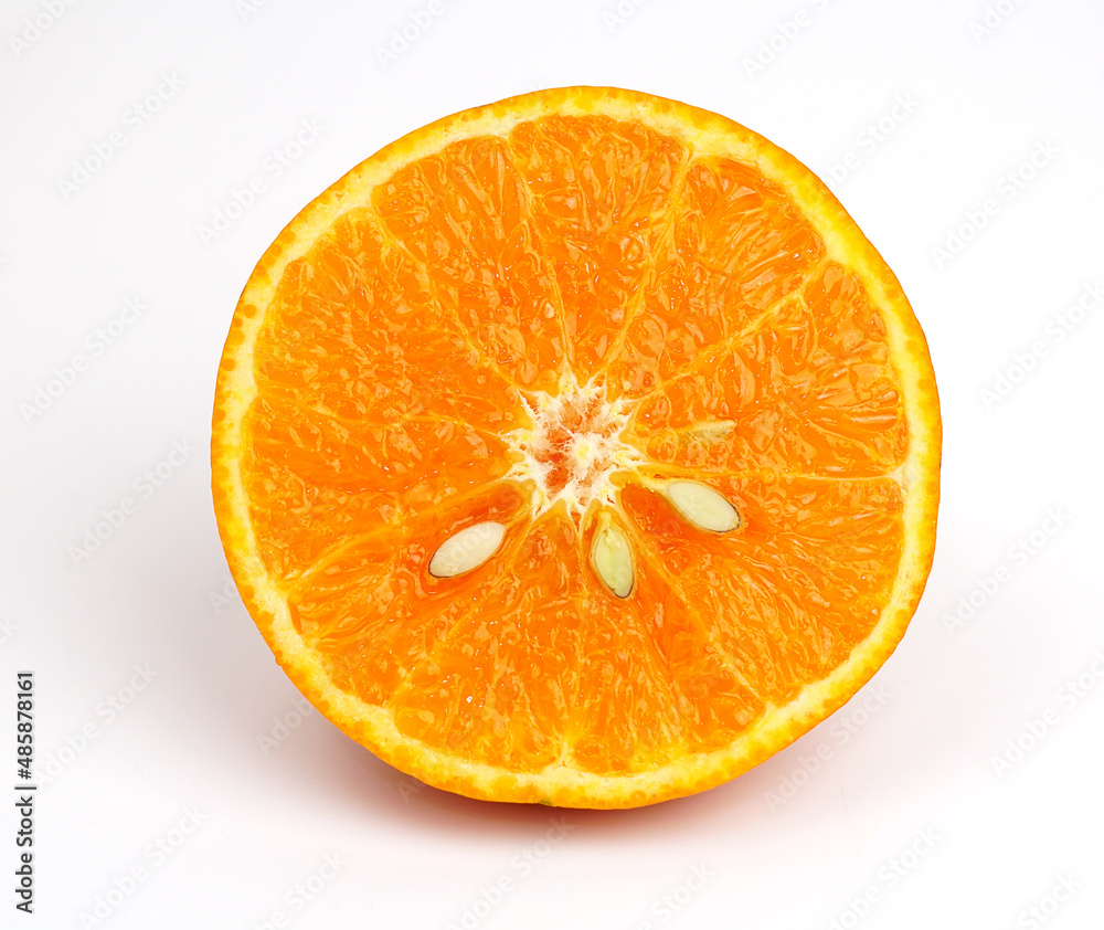 Orange slice isolated on white background. Orange macro studio photo. Orange slice isolated on white background. Orange macro studio photo.