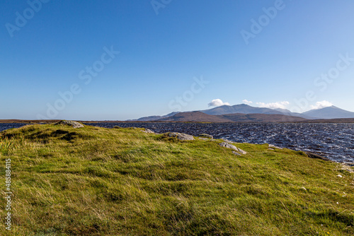 Looking out over Loch Bee on the Hebridean Island of South Uist, on a sunny but windy day photo