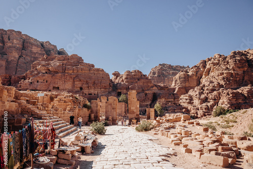 Tourists among the ruins of the ancient city of Petra in Jordan. Colorful photos. Vacation, vacation and travel concept