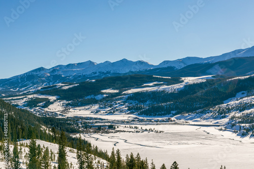 Beautiful winter landscape with evergreen trees and ski tracks in the Rocky Mountains  Colorado  near lake Dillon
