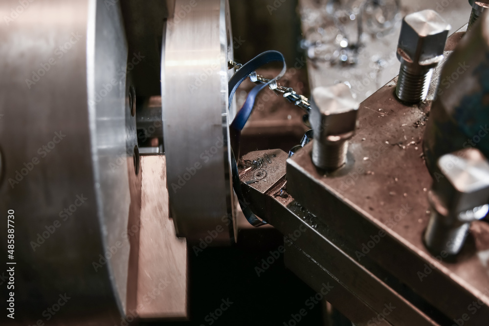 Boring an inner hole with a mechanical cutter on a lathe. Boring an inner hole with a mechanical cutter on a lathe.