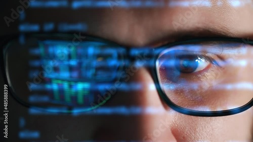 Monitor screen with developing programming and coding technologies. Programmer or hacker is typing code on keyboard. Software engineer working on computer. Developer or big data concept