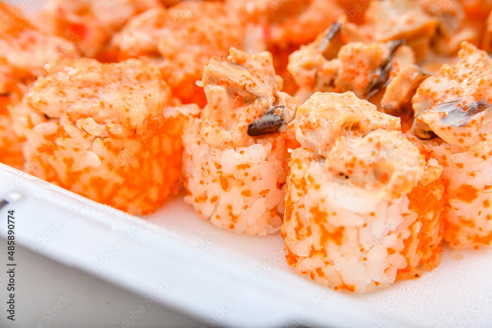 Sushi set. Set of rolls with sauce, shrimp and caviar.