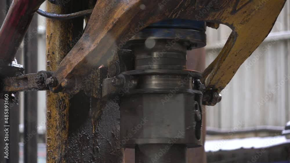 Drilling platform. Pipe rotates. Drilling process. Pipe Holder. Close-up Drilling platform. Pipe rotates. Drilling process. Pipe Holder. Close-up