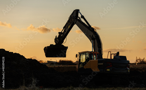 construction crane silhouette at sunset