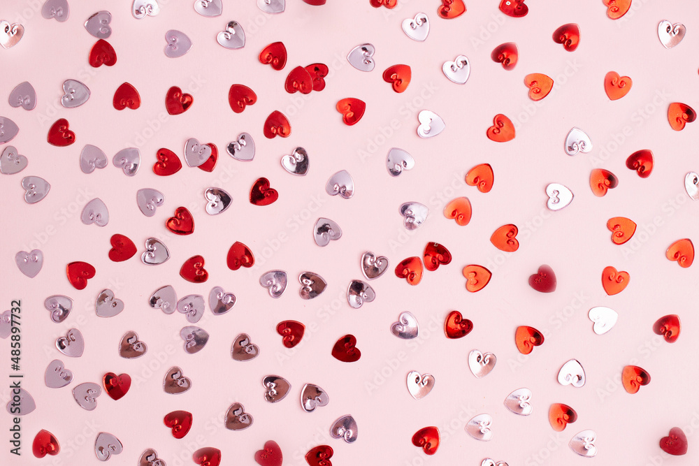 Pattern with red and rose confetti hearts. Pattern with red and rose confetti hearts.
