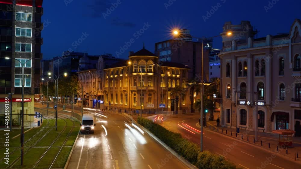 time lapse, izmir city blue skyline and traffic on highway at night with old business buildings time lapse, izmir city blue skyline and traffic on highway at night with old business buildings