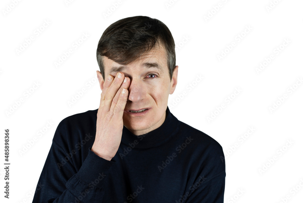 The man on a light background closed one eye with his hand and the other eye is very red, the man has conjunctivitis, the man has emotions of suffering and sadness on his face, eyes hurt The man on a light background closed one eye with his hand and the other eye is very red, the man has conjunctivitis, the man has emotions of suffering and sadness on his face, eyes hurt