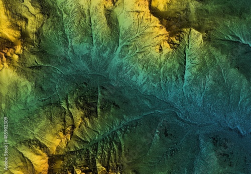 Digital elevation model. GIS product made after proccesing aerial pictures taken from a drone. It shows high rocky and steep mountain peaks. At their feet are visible valleys and mountain lakes