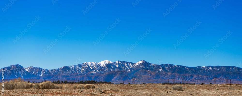 Late winter snow capped mountain range