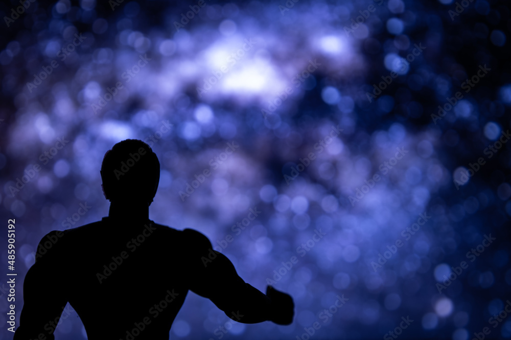 Figure of a blurred humanoid with stars in the sky behind. concept of alien
