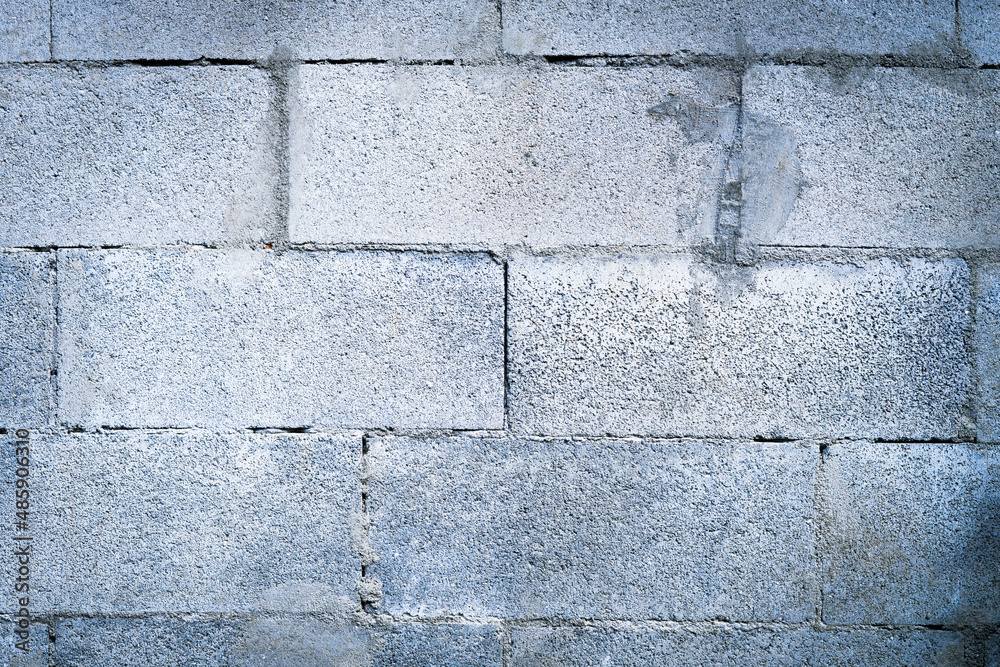 Obraz premium Natural gray brick texture. Concrete block wall background.