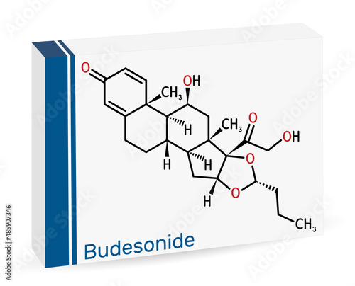 Budesonide,BUD molecule. It is corticosteroid used to treat Crohn's disease, asthma, COPD, hay fever, allergies, ulcerative colitis. Skeletal chemical formula. Paper packaging for drugs