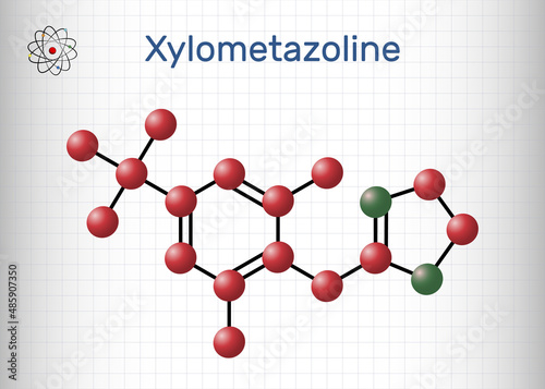 Xylometazoline, xylomethazoline molecule. It is used for the treatment of nasal congestion. Structural chemical formula and molecule model. Sheet of paper in a cage