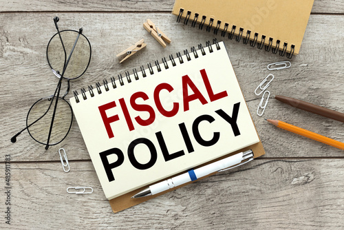 fiscal policy notebook on a wooden table